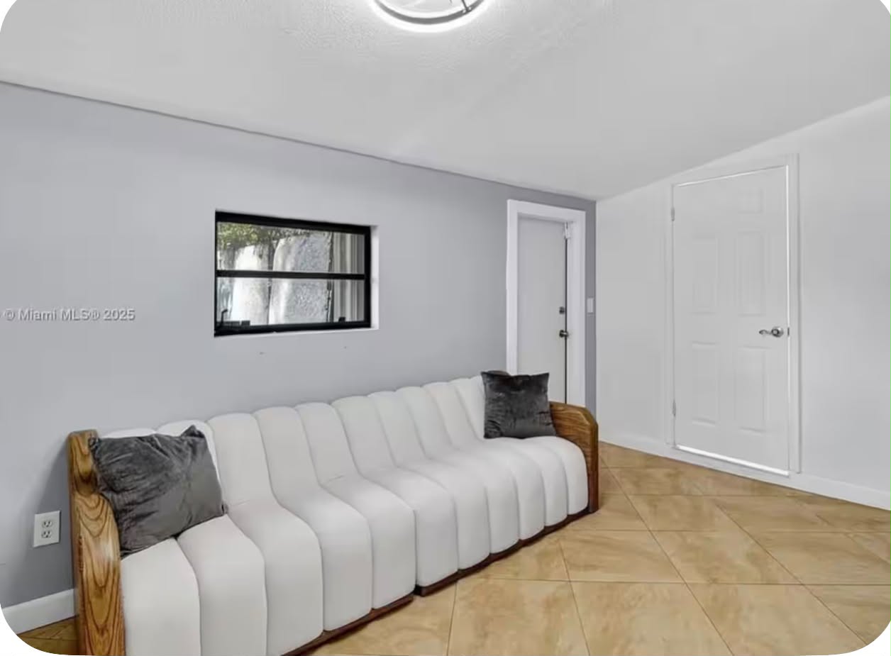 Furnished living area in the Hollywood waterfront pool home